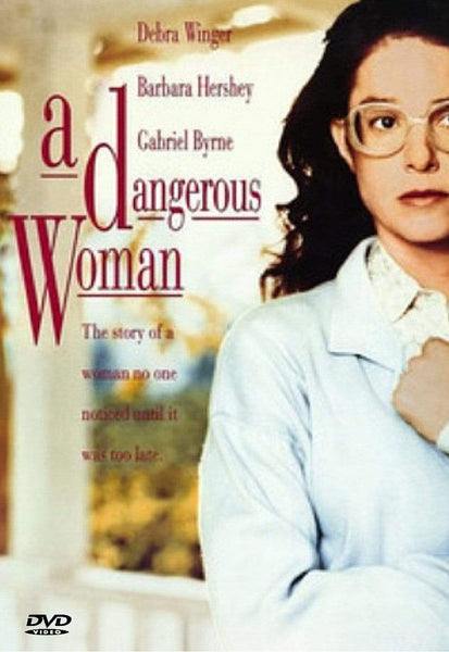 DVD cover of the movie "A Dangerous Woman." The cover features a woman with long hair and glasses, wearing a light-colored top and looking serious. Text on the cover includes the title and names of the stars: Debra Winger, Barbara Hershey, and Gabriel Byrne.
