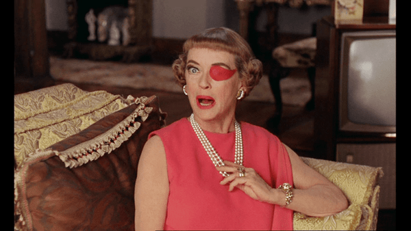bette davis red dress Jezebel Wears Her Fateful Red Dress | as movie star Bette Da