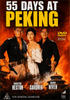 Three figures in historical costume stand before blazing buildings, with bold yellow text announcing "55 Days at Peking." Below, the names Charlton Heston, Ava Gardner, and David Niven showcase the celebrated cast of this classic film, available as the "55 Days at Peking DVD." A DVD Video logo appears on the right.