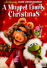 Miss Piggy and Kermit the Frog, dressed in festive holiday outfits, smile in front of a red background adorned with Christmas lights. Text reads: Jim Henson Home Entertainment - A Muppet Family Christmas. This cheerful scene is perfect for fans and collectors looking to add “A Muppet Family Christmas DVD (1987)”—a rare classic—to their holiday movie collection.