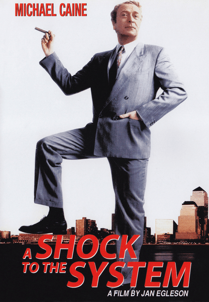 Movie poster for A Shock to the System (1990) DVD featuring Michael Caine in a grey suit, standing giant-sized over a city skyline with one foot propped up, holding a cigar. The text reads "Michael Caine" and "A Shock to the System, A Film by Jan Egleson." An ideal addition for collectors seeking rare movies on DVD or fans looking to add the unforgettable A Shock to the System (1990) DVD to their collection.