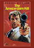 On the cover of The Amsterdam Kill DVD (1977), a man in a suit points a gun directly at the viewer. The title and Robert Mitchum’s name are displayed at the top, complemented by a red textured border around the image—making it a gripping choice for collectors of rare classic movies.