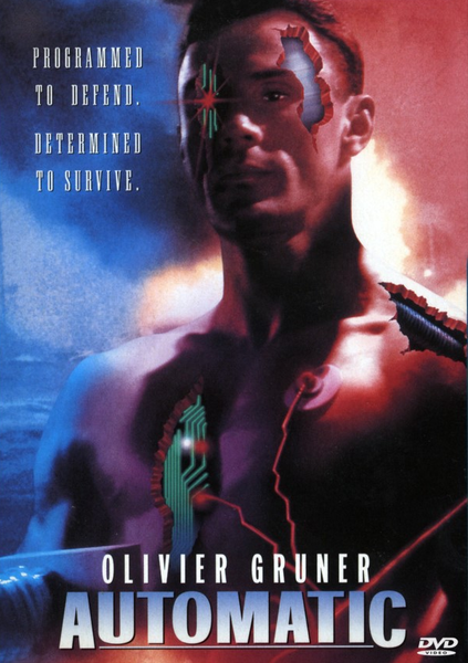 A muscular man with glowing circuits on his body stands in red-blue lighting. Text reads: Programmed to defend. Determined to survive. Built by Robgen Industries as part of their J Series Automatic android security system, he is mankind’s last line of defense. Title: Automatic DVD (1995). DVD logo appears at the bottom right.