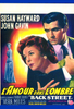 A vintage movie poster depicts a distressed woman in the foreground with a man standing behind her, featuring the names Susan Hayward, John Gavin, and LAMOUR dans LOMBRE Back Street. This eye-catching artwork makes an ideal addition for collectors of Hollywood’s golden era or fans seeking classic films like the Back Street DVD (1961).
