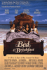 Four people sit together on a large ornate bed holding breakfast trays in this image, which serves as the cover for the Bed & Breakfast DVD (1991), a romantic comedy featuring the main cast with the movie title and credits displayed below them.