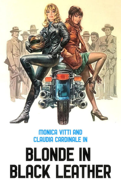 Two women pose back-to-back on a motorcycle, one dressed in a black leather outfit with a helmet and the other wearing a brown jacket and green skirt. Men in suits are visible in the background. Text reads: Blonde in Black Leather. Now available as Blonde in Black Leather (1975) DVD—grab this cult classic film on DVD before it’s gone!.