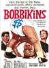 A cheerful baby in a diaper adorned with a dollar sign does a handstand while amused adults laugh nearby. Text reads: Bobbikins DVD (1959) – the world’s youngest financial wizard! Featuring beloved actors, this delightful gem is a rare treasure among hard-to-find classic films on DVD—perfect for discerning collectors and film lovers alike.