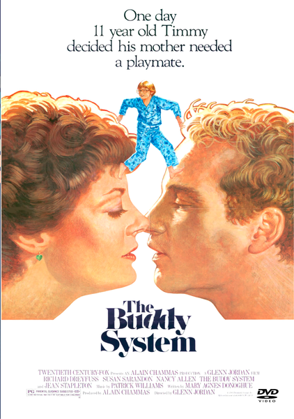 A boy in blue pajamas balances atop the faces of two adults, their noses nearly touching. Text above says, “One day 11-year-old Timmy decided his mother needed a playmate.” Below is the title: The Buddy System DVD (1984)—a rare and hard-to-find film featuring unforgettable performances reminiscent of a classic Susan Sarandon movie.