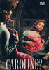 A woman sits holding a pink dress, gazing pensively into a large ornate mirror where her reflection is visible. The words “Caroline? DVD (1990)” appear in bold at the bottom—an evocative scene reminiscent of hard-to-find and classic movies on DVD that are cherished by collectors.