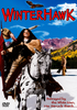A Native American man in traditional attire rides a spotted horse through snowy mountains, while another man stands in the background. The text reads WINTERHAWK and Betrayed by the White Man, He Struck Back... The Winterhawk DVD (1975) is a must-see for fans of rare classic movies—discover the legend today.