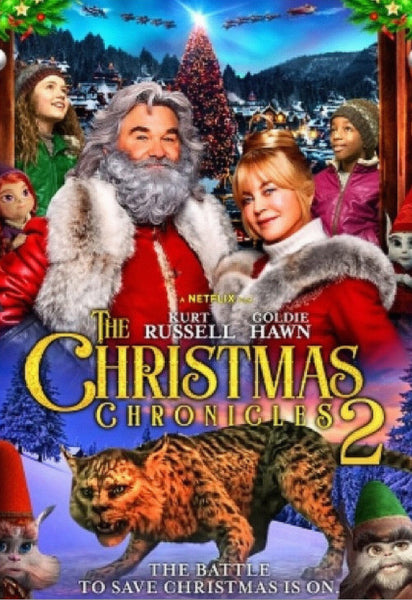 The DVD cover for The Christmas Chronicles 2 (2020) features two adults dressed in festive attire, accompanied by playful elves and animals, set against the backdrop of a snowy village. The bottom of the cover reads: "The battle to save Christmas is on." This holiday adventure is a perfect choice for anyone looking to add rare magic and festive fun to their Classic Movies on DVD collection.