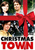 DVD cover of Christmas Town (2008) DVD featuring a woman, a man, and a boy standing in front of a reindeer, all framed by a large red ribbon and bow. Ideal for collectors of classic movies on DVD, the bold movie title “Christmas Town (2008)” is displayed at the bottom.