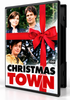 DVD case cover for the Christmas Town (2008) DVD, featuring a man, a woman, and a boy standing next to a reindeer wrapped in a red ribbon, with the title at the bottom.