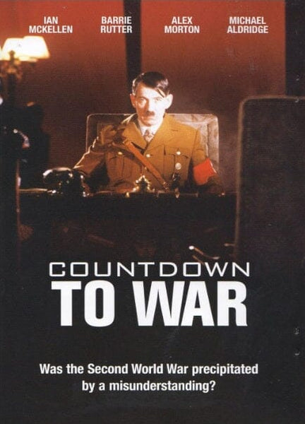 Countdown to War (1989) DVD movie poster shows a man as Adolf Hitler seated at a desk with a stern look. The tagline reads: “Was the Second World War precipitated by a misunderstanding?”.
