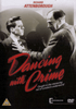 The DVD cover for Dancing with Crime DVD (1947) depicts two men locked in confrontation, one clutching the other's lapels—a tense scene that captures the film's underworld setting. The title appears in bold red script above the tagline: "Caught in the menacing net of London’s underworld." This film noir classic follows a London cab driver pulled into a world of crime, making it an essential addition for collectors and fans of vintage movies on DVD.