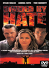 The DVD cover for Divided By Hate DVD (1997) features three intense-looking individuals standing before a blazing sky, with the title displayed prominently in bold red letters and a tagline hinting at a deadly confrontation. The DVD Video logo appears in the lower right corner, making this Divided By Hate DVD (1997) an excellent option for collectors searching for rare movies on DVD.