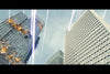 Skyscrapers are under attack by intense beams of light from above; one building burns while the other stands untouched, evoking scenes reminiscent of a classic monster movie—just like those in the Shin Godzilla (2016) DVD.