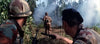 Three soldiers in camouflage move through a smoky jungle; two crouch in the foreground while one advances with a rifle—a gripping scene from the rare DVD "Tornado: The Last Blood (1983).