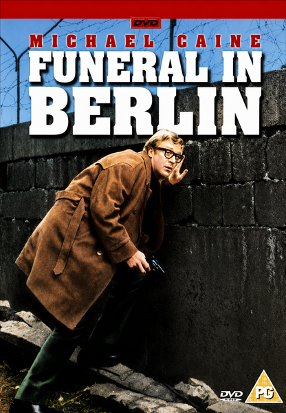 A man in a brown coat holding a gun crouches beside a concrete wall topped with barbed wire. Prominent text reads “Funeral In Berlin DVD (1966),” highlighting this classic spy movie starring Michael Caine. DVD and PG rating logos appear at the bottom, marking it as part of the Harry Palmer collection.