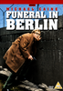 A man in a brown coat holding a gun crouches beside a concrete wall topped with barbed wire. Prominent text reads “Funeral In Berlin DVD (1966),” highlighting this classic spy movie starring Michael Caine. DVD and PG rating logos appear at the bottom, marking it as part of the Harry Palmer collection.