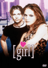 A man and a woman stand before a cityscape under a pink sky, with the word "girl" in white script and a pink heart above it. Dominique Swain, who stars in the 1998 coming-of-age grunge film "Girl," wears an animal print outfit, while the man is dressed in black. The Girl DVD (1998) logo appears in the corner.