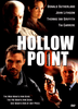 DVD cover for Hollow Point DVD (1996), the action film, showcasing four actors’ faces—including John Lithgow and Tia Carrere—with their names at the top. The title appears in bold lettering with a bullet replacing the letter "O," and taglines below evoke themes of crime and pursuit.