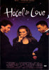 Three people dressed in black stand against a purple backdrop. The smiling woman at the center is flanked by two men, each with a rose imprint on his cheek and holding a rose. The text reads: “Hotel de Love.” The Hotel de Love DVD (1996) is a rare romantic comedy that makes a charming addition to any collection of hard-to-find movies on DVD.