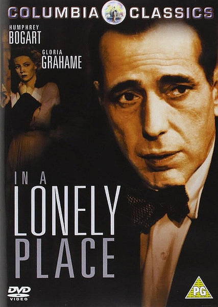 DVD cover for In A Lonely Place (1950) DVD shows a man in a suit and bowtie close-up, with a woman behind him. The title and actors' names stand out—perfect for fans of classic films on DVD.