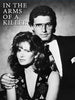 Black-and-white image of a man in a suit and glasses standing behind a woman in a patterned dress. Large text at the top left reads "In the Arms of a Killer (1992) DVD," an uncommon crime drama release.