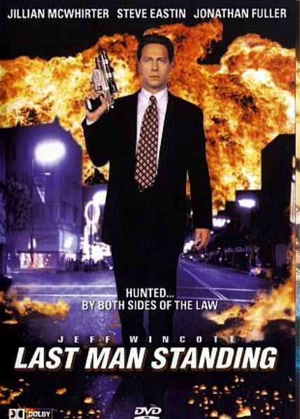 A man in a suit holding a gun walks down a city street with a massive fire explosion behind him. The image features the movie title “Last Man Standing” along with the actors’ names, making this an iconic cover for collectors and anyone searching for the hard-to-find Last Man Standing DVD (1995), a true classic action thriller.