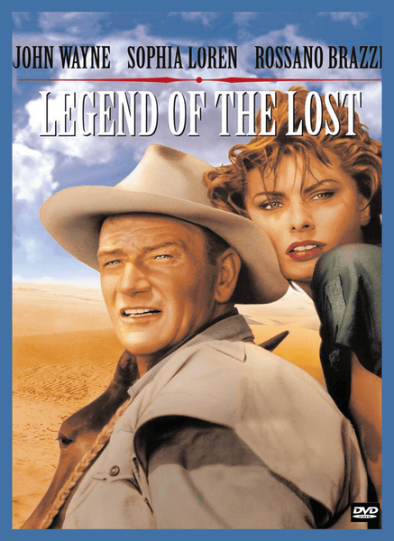 Promotional poster for Legend of the Lost DVD (1957), showcasing a cowboy in a hat standing in the desert with a woman behind him; starring John Wayne, Sophia Loren, and Rossano Brazzi as credited at the top. An excellent choice for collectors of rare, hard-to-find films or anyone looking to add classic movies on DVD to their collection.