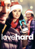 A woman in a Santa hat holds a phone with a man’s dating profile as another smiles in the background. Love Hard (2021) DVD is shown at the bottom with the Netflix logo in the corner.