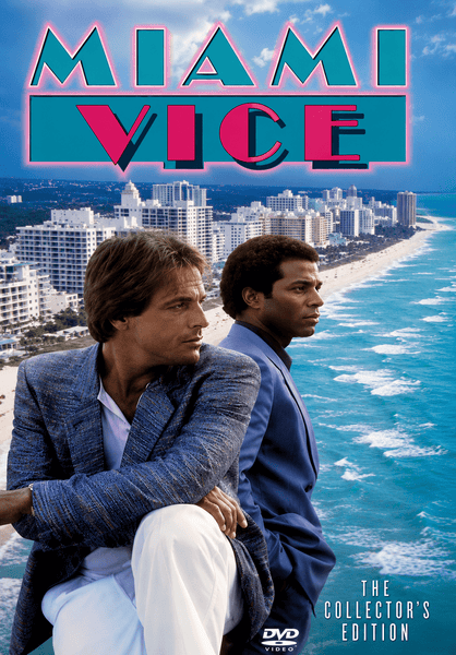 Two men in suits pose before a vibrant Miami beach skyline. Bold pastel “Miami Vice” lettering tops the cover, while “The Collectors Edition” and a DVD symbol appear below, highlighting the iconic 1984 TV movie starring Don Johnson. Perfect for fans, the Miami Vice (Movie) DVD (1984) captures all the classic action and signature style of the original series.