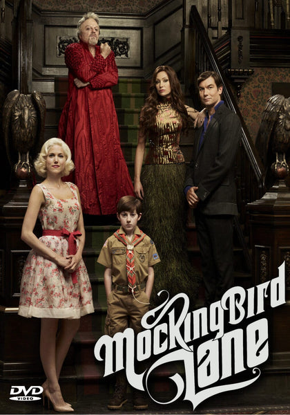 Five people in vintage costumes pose on a staircase in an ornate house, capturing the quirky charm of the Munsters-inspired series. The text "Mockingbird Lane (2012) DVD" appears at the bottom right, highlighting this rare and hard-to-find title. A Mockingbird Lane DVD logo is featured at the bottom left.