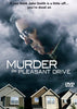 A stern man’s face appears in stormy clouds above suburban houses. Text: If you think John Smith is a little off… you’re dead on. Murder On Pleasant Drive DVD logo shown.
