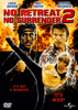 Three martial artists strike dramatic poses in front of a fiery explosion on the cover of No Retreat No Surrender 2 DVD (1987). Bold red letters display the title, with cast names—such as American kickboxer Loren Avedon—listed above. The tagline “It’s not a rematch... It’s war!” is shown below, alongside an Action DVD Universal logo in the corner.