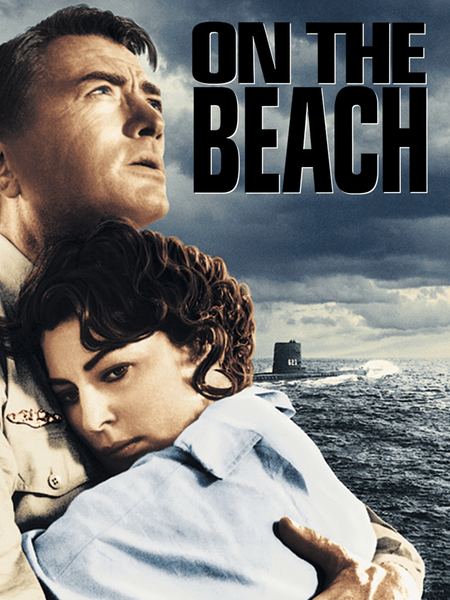 A man in uniform embraces a woman with dark curly hair by stormy ocean waves under a cloudy sky. "On The Beach (1959) DVD" appears in bold, recalling the classic film's dramatic romance.