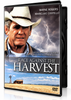 The Race Against The Harvest DVD cover features a man in a cowboy hat standing against a stormy sky above a field with a barn and windmill.