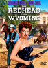 A woman in a blue dress holds a rifle in the foreground while a sheriff and two men battle on horseback in a Western town. Starring Maureen O’Hara, this dynamic scene represents the excitement of The Redhead from Wyoming (1953) DVD—a must-have for classic movie collectors and enthusiasts. Text reads: The Redhead from Wyoming.