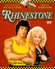 DVD cover for Rhinestone DVD (1984) featuring a man in a yellow tank top and a woman with curly blonde hair dressed in black, both smiling. The background has a red color with yellow checker trim, and their names are displayed in text. This classic 1980s comedy stars Dolly Parton in one of her most iconic film performances.