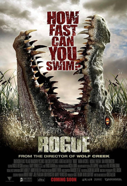 A DVD cover for Rogue (2007) features a giant crocodile’s open jaws rising from water, with “HOW FAST CAN YOU SWIM?” above and the title at the bottom, along with production credits and “COMING SOON” highlighted.