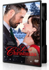 The cover of The Spirit of Christmas (2015) DVD features a man in a suit and a woman in a red dress gazing at each other in front of a snow-covered building.