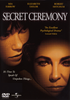 Secret Ceremony DVD (1968) cover features a close-up of two women’s faces, with text highlighting stars Mia Farrow, Elizabeth Taylor, and Robert Mitchum alongside a review quote. The tagline reads: “It’s Time To Speak Of Unspoken Things....” This psychological drama exemplifies the gripping intensity of an Elizabeth Taylor film at its best.