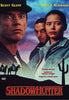 Shadow Hunter DVD (1993) features a striking movie poster with three intense characters, a desert scene dotted with cacti, two horseback riders, and tagline text hinting at a deadly game. The names Scott Glenn and Angela Alvarado are prominently displayed at the top. This rare DVD is an essential addition for fans of classic movies and collectors alike.