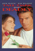 The Tall Dark and Deadly DVD (1995) features a striking cover: a man gazes forward while a woman, holding a red rose, looks at him. Add this rare classic to your collection with the Tall Dark and Deadly DVD (1995).
