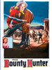 A vintage movie poster for The Bounty Hunter (1954) DVD features a cowboy with a rifle stepping forward, a woman’s portrait inset, and a dramatic Western town shootout in the background. Bold text at the bottom announces “The Bounty Hunter.” This is an ideal collectible for fans of classic bounty hunter western adventures on DVD.