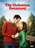 A smiling couple in red and green sweaters stands close together, holding a glowing ornament, with “The Christmas Ornament (2013) DVD” title displayed above them and Christmas trees in the background—an ideal choice for anyone looking to enjoy timeless holiday movies or add a festive touch to their Christmas movie DVD collection.
