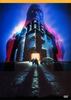A dark castle illuminated by blue and red lights stands before two figures and a car approaching its entrance, while a giant shadowy figure looms in the background beneath a yellow sky—a haunting scene evocative of Michael Mann’s cult classic, The Keep DVD (1983).