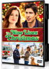 DVD case for The Nine Lives of Christmas (2014) featuring a man and woman above the title, and a scene of the couple holding hands with a dog in a snowy residential street below.