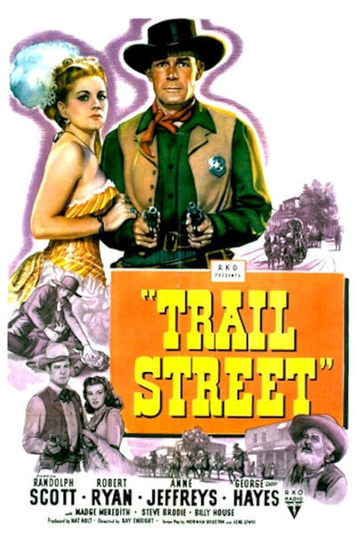 Poster for the classic western Trail Street (1947) DVD features a cowboy holding two guns and a woman standing beside him, set against a backdrop of western life, horses, and townsfolk. The film’s title and cast are displayed prominently—making this DVD an essential addition for collectors of rare movies.